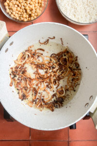 top down view of caramelized onions for pulao