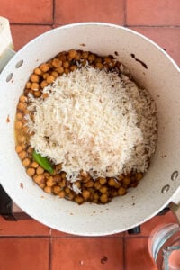 rice and chilies added to chana chawal