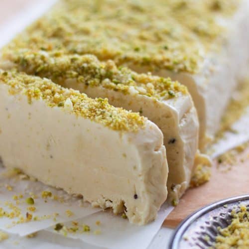 A Kulfi Ice Cream cut into slices and slightly separated