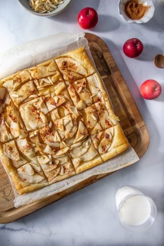 A Puff Pastry Apple Tart on a board