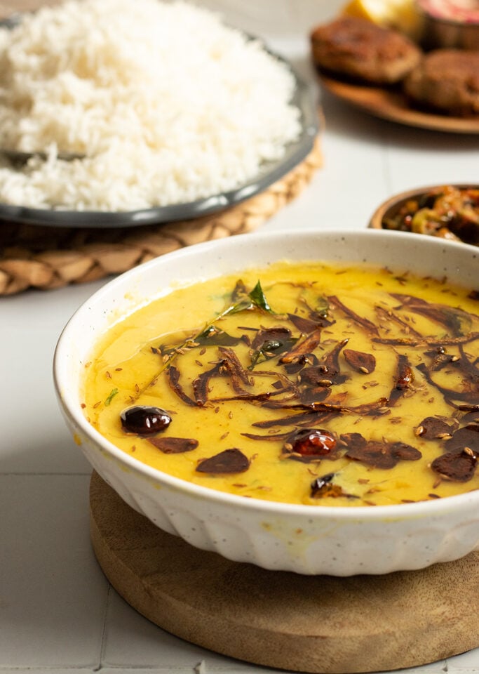 Moong ki daal in a bowl, rice in the background