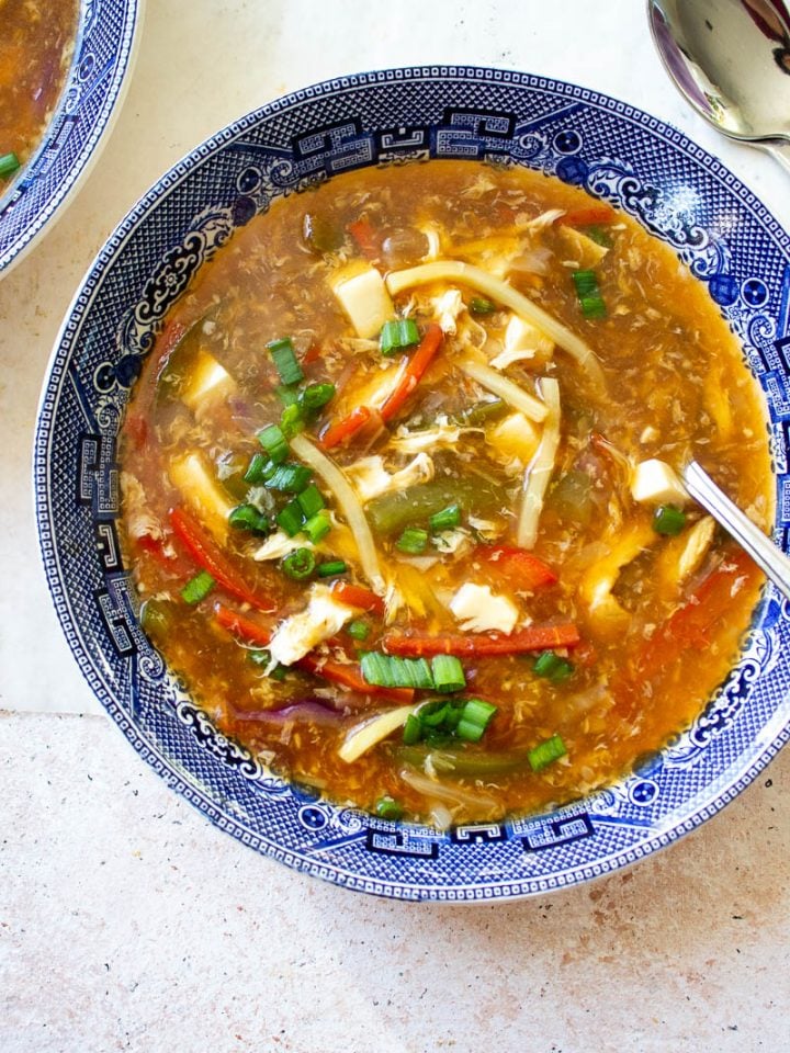 a bowl of hot and sour soup top down