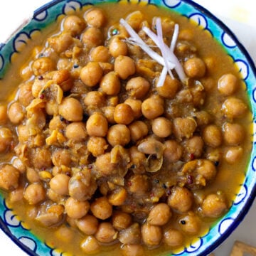 top down view of a plate of poori chana or puri chole