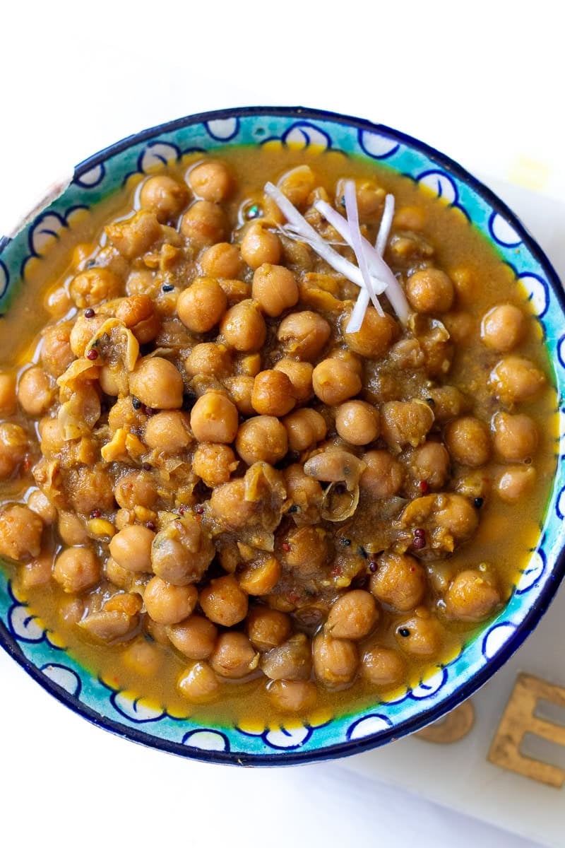 top down view of a bowl of poori or nashtay walay chole