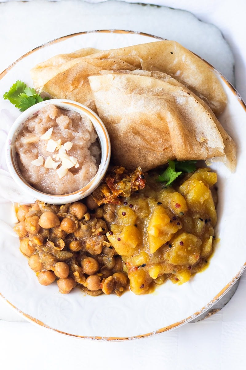 a plate of halwa poori nashta