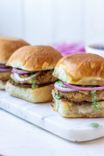 3 Partial Views of Bun Kababs on a marble board