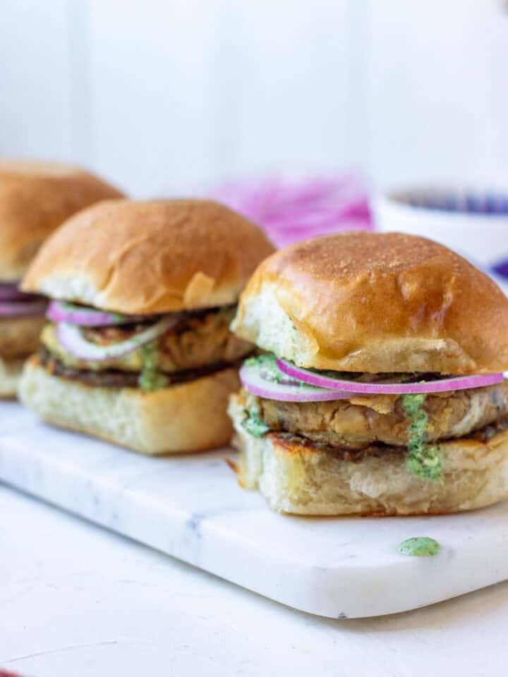 3 Partial Views of Bun Kababs on a marble board