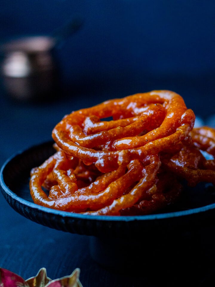 Jalebis stacked in a bowl