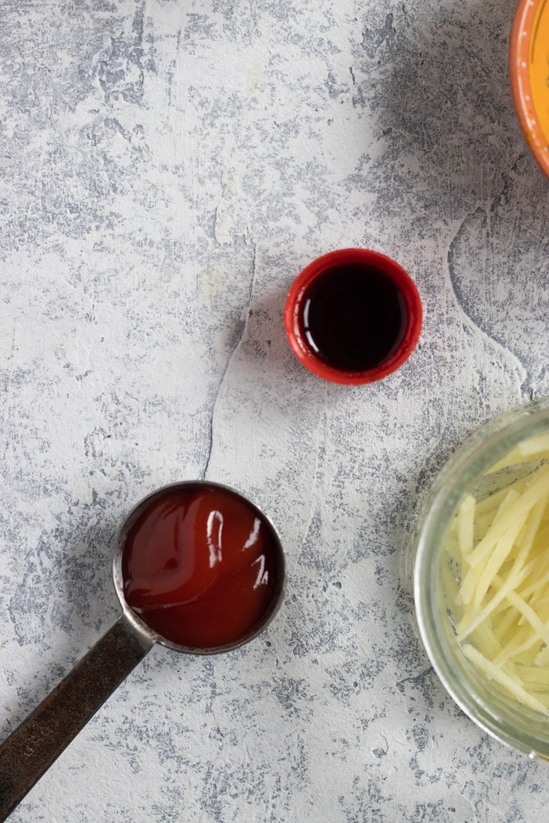 One tbsp of ketchup and one spoon soy sauce