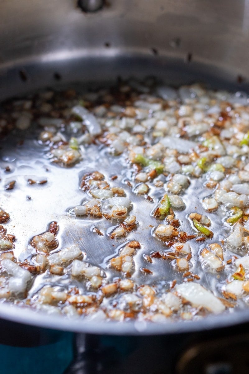 onions cooking for baingan aloo