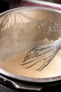 whisking instant pot kheer to break up any lumps