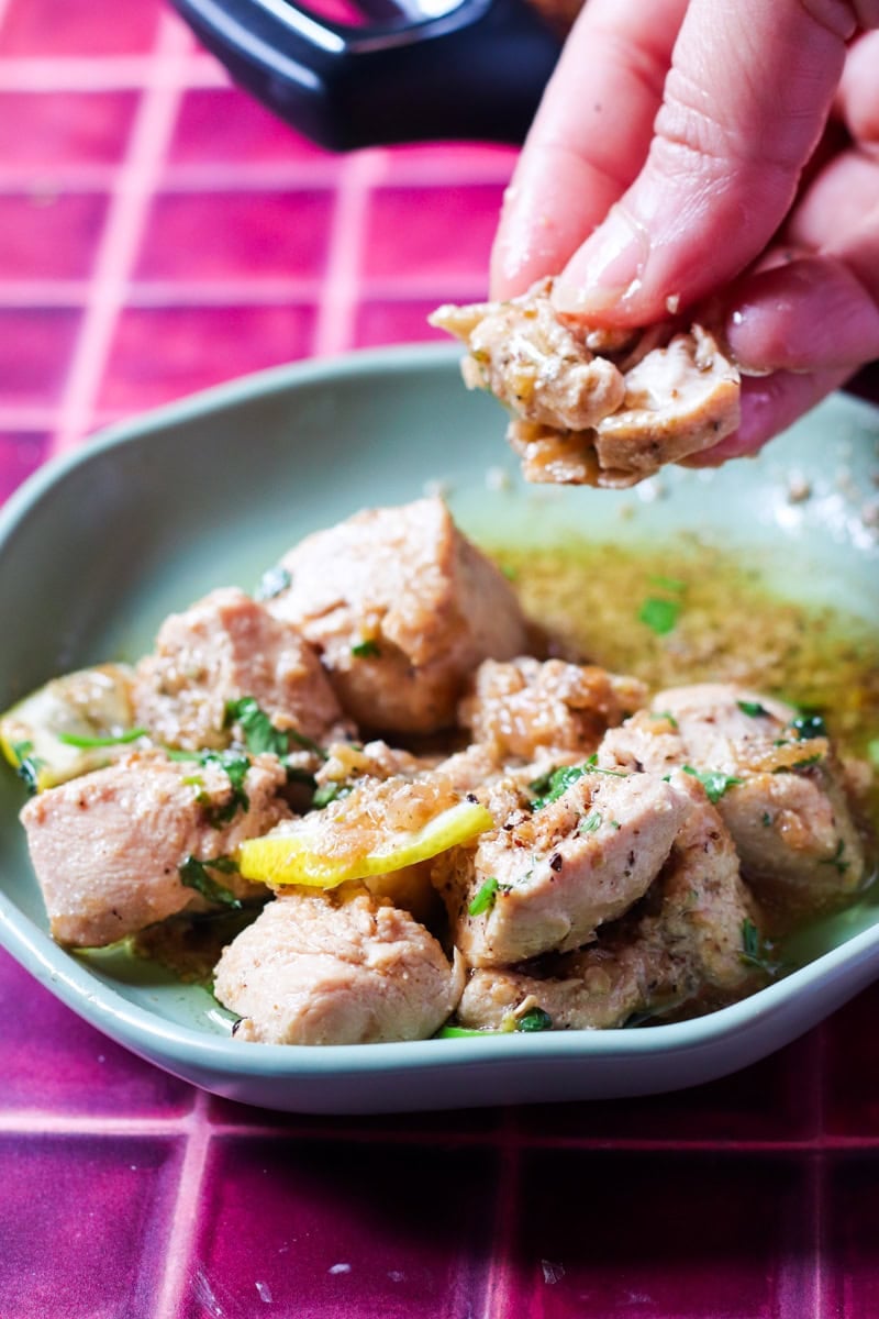pepper chicken being eaten with roti