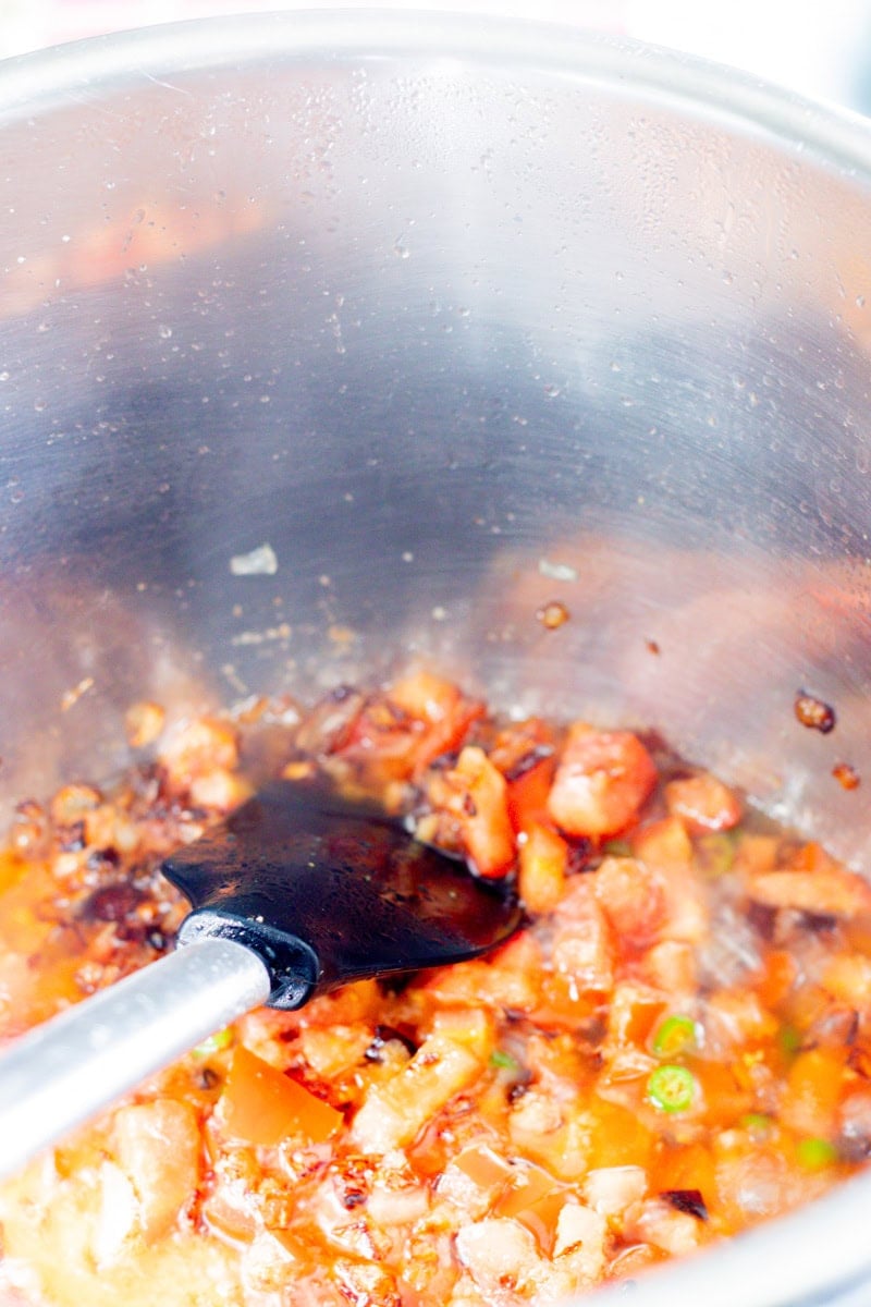 chopped tomatoes in the instant pot with onions masala 
