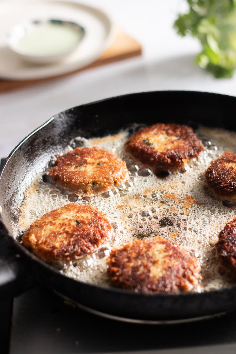 shami kababs frying in a pan