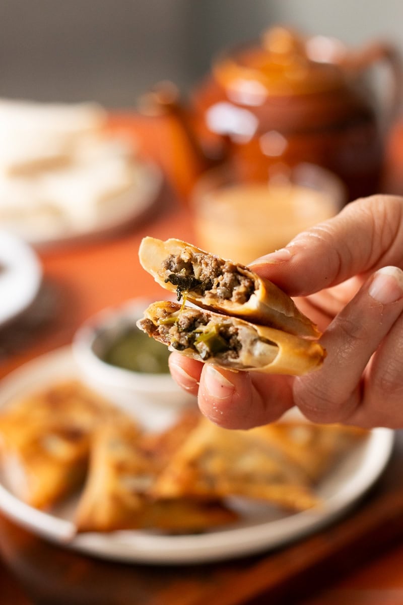 juicy keema samosas open in half
