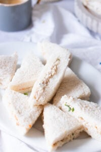 sliced chicken sandwiches in a platter