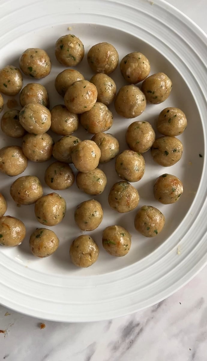 a plate of prepped mini koftay